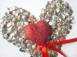 Shining glass beads, spangles and a heart