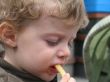 blond boy eating french fries