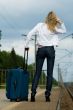 young lady waiting a train