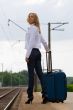 young lady waiting a train