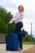 young lady waiting a train