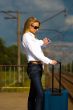 young lady waiting a train