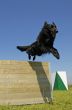 jumping black dog