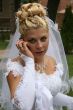 Young bride with cell phone