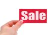 hand holding sale card