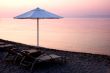 evening sea and umbrella