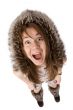 very surprised woman in fur hat