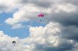 Two parachutes in the sky