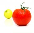 Yellow apple and tomato