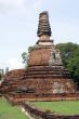 Red stupa and greem grass