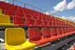 Lines of color seats.