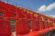 Lines of color seats.