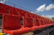 Lines of color seats.