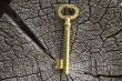 Old key of gold colour.