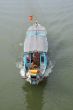 Boat on the green water