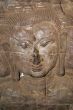 Wall and face of Buddha