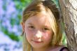 Smiling six year old girl at playground