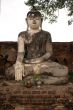 Buddha on the brick wall in Inwa, Mandalay, Myanmar