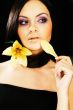 brunette girl posing on dark background