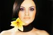 brunette girl posing on dark background