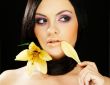 brunette girl posing on dark background