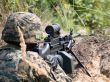 Soldier shooting his machine gun