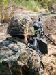 Soldier shooting his machine gun