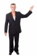 smiling businessman with indicating gesture