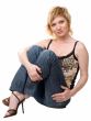 woman sits on a white background