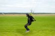 Landing of the sportsman after parachute jump