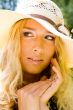 Pretty blond woman in a hat