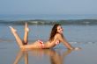 Beautiful girl on the ocean beach