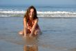 Beautiful girl on the ocean beach