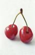 Red cherry in two faces
