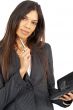Beautiful brunette businesswoman holding a diary
