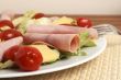 Fresh salad with cold meat, greens and peppers