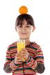 Girl drinking orange juice