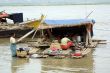 Women and houseboat in Mandalay
