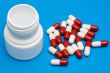 Pills over blue background
