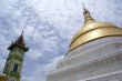 Green tower and golden stupa