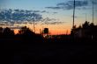 sunset in the orange sky setting over prison yard