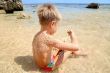  Boy playing on the beach