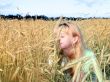 Sunny young beauty girl the field under blue sky 2