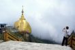 Golden rock and tourist