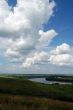 Cumulus clouds above the river