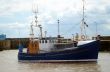 Fishing trawler in harbor