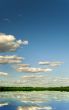 Cumulus clouds over lake