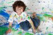 Boy playing with painting