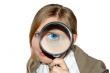 businesswoman with Magnifying Glass