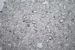 drops of rain water on a fresh asphalt